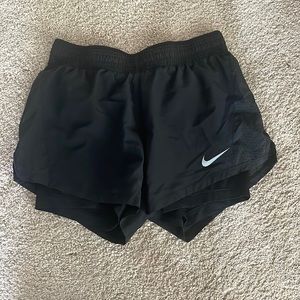 these are some black athletic shorts with built in spandex underneath